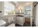Bright bathroom with stylish fixtures, black and white tile, and updated vanity at 1860 Anjaco Nw Rd, Atlanta, GA 30309