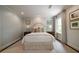 Neutral bedroom with carpet flooring, crown molding, and natural light at 1860 Anjaco Nw Rd, Atlanta, GA 30309