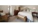 Charming bedroom featuring a woven bench, natural light, and soothing color palette at 1860 Anjaco Nw Rd, Atlanta, GA 30309