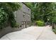 Long driveway that leads to a private backyard featuring a sports court at 1860 Anjaco Nw Rd, Atlanta, GA 30309