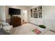 Comfortable living space with built-in shelving, hardwood floors, and elegant decor at 1860 Anjaco Nw Rd, Atlanta, GA 30309