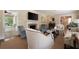 Inviting living room with large windows, fireplace, and comfortable seating arrangement at 1860 Anjaco Nw Rd, Atlanta, GA 30309