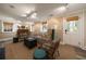 Comfortable living area with plush seating, a doorway to the outside, and ample natural light at 1860 Anjaco Nw Rd, Atlanta, GA 30309