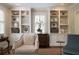 Cozy living area with built-in cabinets, hardwood floors, and comfortable seating at 1860 Anjaco Nw Rd, Atlanta, GA 30309