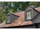 Close up of weathered roof and dormer windows at 1860 Anjaco Nw Rd, Atlanta, GA 30309