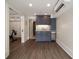 Modern wet bar with custom cabinetry and mini fridge, perfect for entertaining at 1860 Anjaco Nw Rd, Atlanta, GA 30309