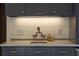 Close up of a wet bar area featuring a stylish faucet and soap dispensers at 1860 Anjaco Nw Rd, Atlanta, GA 30309