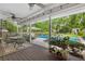 This backyard features a covered patio and in-ground pool, great for entertaining at 1036 Oxford Ne Rd, Atlanta, GA 30306