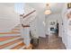 Bright entry foyer featuring hardwood floors, staircase, and living room with fireplace at 1036 Oxford Ne Rd, Atlanta, GA 30306