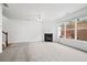 Spacious living room featuring a fireplace and large windows for natural light at 125 Flatwood, Marietta, GA 30066
