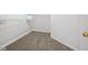 Walk-in closet with carpeted floor and white wire shelving at 125 Flatwood, Marietta, GA 30066