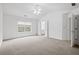 A spacious bedroom, featuring an ensuite bathroom and a neutral color scheme throughout at 125 Flatwood Trail, Marietta, GA 30066