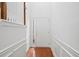 Bright foyer with hardwood floors, white trim, and staircase, creating a welcoming entrance at 125 Flatwood Trail, Marietta, GA 30066