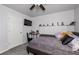 Cozy bedroom with comfortable carpet, a ceiling fan, and ample space for relaxation and personalization at 192 Sandhurst Ct, Suwanee, GA 30024