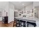 Spacious kitchen with granite counters, stainless appliances, and island seating at 192 Sandhurst Ct, Suwanee, GA 30024