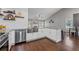 Well-equipped kitchen with white cabinets, stainless steel appliances, and granite countertops at 192 Sandhurst Ct, Suwanee, GA 30024