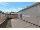 Backyard with partial privacy fence and concrete patio at 2022 Patterson Park Dr, Lawrenceville, GA 30044