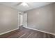 Bedroom with wood look floors and light colored walls at 2022 Patterson Park Dr, Lawrenceville, GA 30044