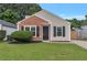 Charming single-story home with brick and siding exterior, well-maintained lawn and simple landscaping at 2022 Patterson Park Dr, Lawrenceville, GA 30044