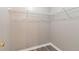 A clean walk in closet with wire shelving and light-colored walls at 2022 Patterson Park Dr, Lawrenceville, GA 30044