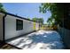 Backyard featuring a spacious concrete patio, and new fence, perfect for outdoor entertaining at 4244 Lindsey Dr, Decatur, GA 30035