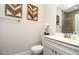 Clean bathroom with modern vanity, updated sink, and walk-in shower at 4327 Azalea Ridge Way, Hoschton, GA 30548