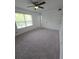 Bedroom includes plush carpet, large window and closet at 48 Peachtree Ne Ave # 321, Atlanta, GA 30305