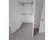 Walk-in closet with double doors and built in racks at 48 Peachtree Ne Ave # 321, Atlanta, GA 30305