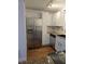 The kitchen has stainless steel appliances, granite countertops, and ample cabinet space at 48 Peachtree Ne Ave # 321, Atlanta, GA 30305