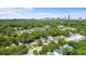 View of houses among lush trees with downtown Atlanta skyline in the background at 995 Lena Nw St, Atlanta, GA 30314