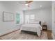 Comfortable bedroom with neutral decor, ceiling fan, and ample natural light at 995 Lena Nw St, Atlanta, GA 30314