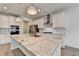 Gourmet kitchen boasts granite counters, stainless steel appliances, and ample cabinet space at 2090 Harvester Ln, Buford, GA 30518