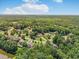 Aerial view of a neighborhood surrounded by dense trees at 3315 High Noontide Nw Way, Acworth, GA 30101