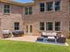 Spacious backyard featuring a patio with seating, a grill and lush green grass at 3315 High Noontide Nw Way, Acworth, GA 30101