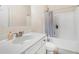 Clean bathroom featuring a shower-tub combo with a shower curtain and a white vanity with a sink at 3315 High Noontide Nw Way, Acworth, GA 30101