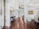 Elegant foyer with hardwood floors, a high ceiling, and an open staircase to the second floor at 3315 High Noontide Nw Way, Acworth, GA 30101