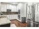 Modern kitchen with stainless steel appliances, granite countertops and island at 3315 High Noontide Nw Way, Acworth, GA 30101