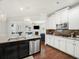 Bright kitchen with granite countertops, stainless steel appliances, island, and hardwood floors at 3315 High Noontide Nw Way, Acworth, GA 30101