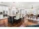 Open kitchen with granite countertops, stainless appliances, and large island with seating at 3315 High Noontide Nw Way, Acworth, GA 30101