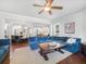 Comfortable living room with a ceiling fan, and a view of the kitchen and dining area at 3315 High Noontide Nw Way, Acworth, GA 30101