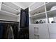A closet offers shelving and drawer storage to keep clothes and accessories well-organized at 400 17Th St # 2325, Atlanta, GA 30363