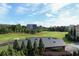 Scenic view overlooking the lush golf course with blue skies and mature trees at 400 17Th St # 2325, Atlanta, GA 30363
