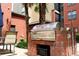Outdoor brick grill area with stainless steel top, seating, and landscaping for residents to use at 400 17Th St # 2325, Atlanta, GA 30363