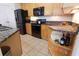 Kitchen featuring stone countertops, stainless steel appliances and modern cabinetry at 400 17Th St # 2325, Atlanta, GA 30363