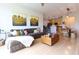 Open concept living and dining space with modern decor, couch and a table with seating at 400 17Th St # 2325, Atlanta, GA 30363