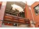 Sign for Westside Provisions with a metal pig hanging from the ceiling above it at 400 17Th St # 2325, Atlanta, GA 30363