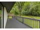 Large back deck overlooking a grassy backyard, perfect for outdoor relaxation and entertaining at 1553 Mccallie Nw Blvd, Atlanta, GA 30318