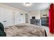 Bedroom with a gray bed frame, carpeted floors, and two closets at 1626 Waterchase Dr, Dacula, GA 30019