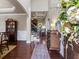 Elegant foyer featuring dark wood floors, coffered ceilings, decorative accents, and an open view of the home at 1626 Waterchase Dr, Dacula, GA 30019