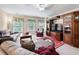 Comfortable living room with plush sofas, a ceiling fan, and bright windows at 1626 Waterchase Dr, Dacula, GA 30019